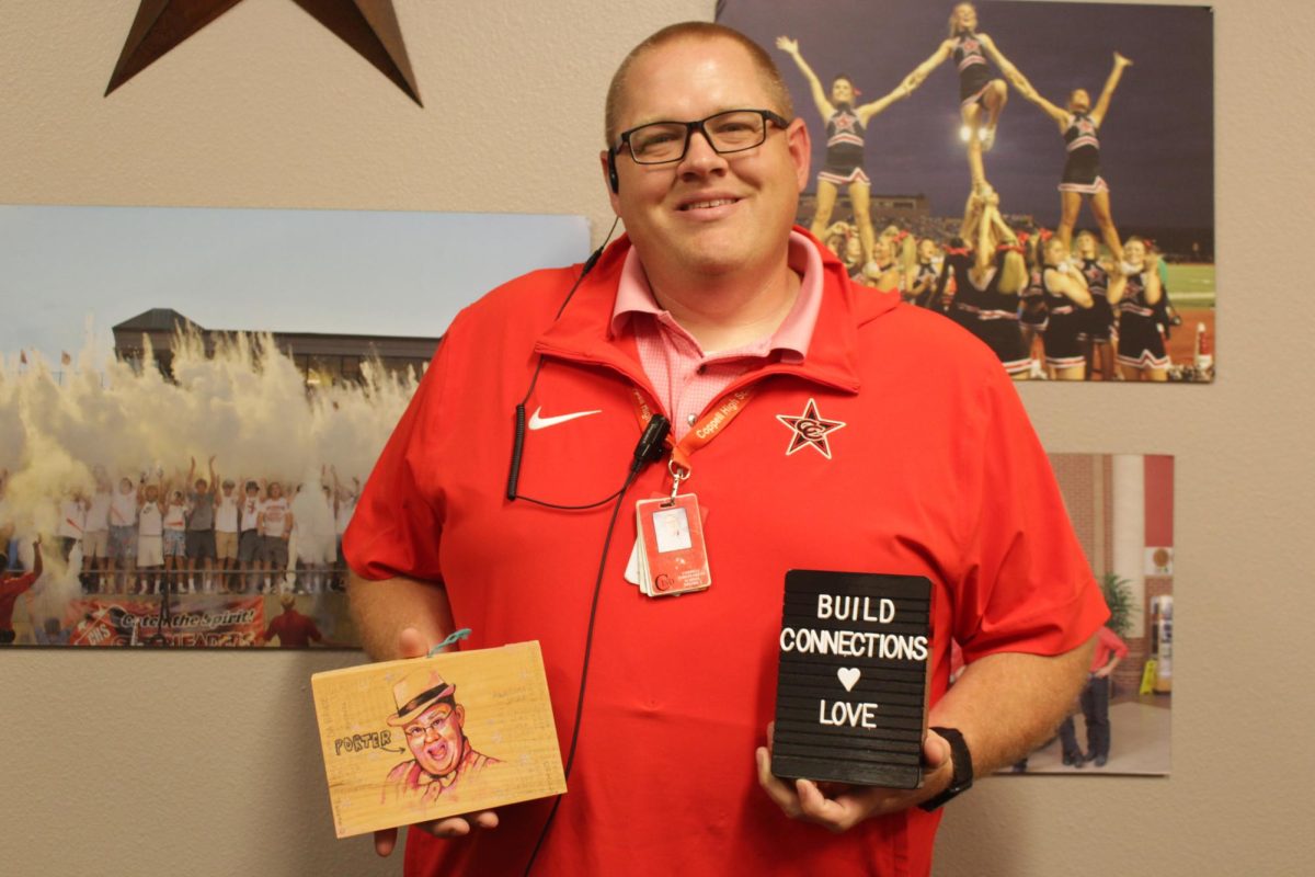 Coppell High School associate principal Zane Porter keeps mementos from his time teaching at New Tech High @ Coppell in his office at CHS. On April 8, Porter was named principal of NTH@C.