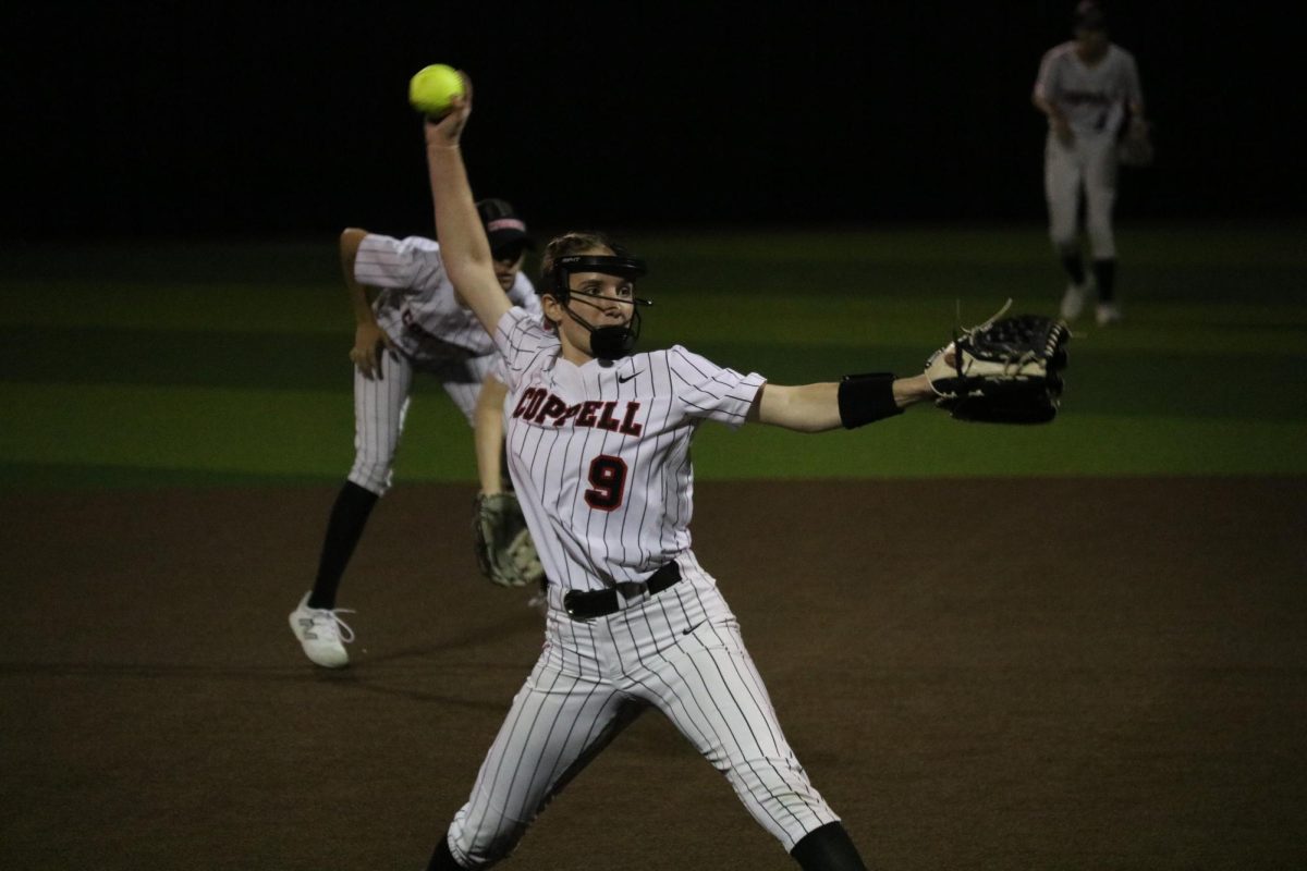 Coppell+junior+Carly+Mayer+pitches+during+the+fourth+inning+against+Flower+Mound+at+the+Coppell+ISD+Baseball%2FSoftball+Complex+on+Friday.+The+Cowgirls+play+Plano+Senior+on+Friday.