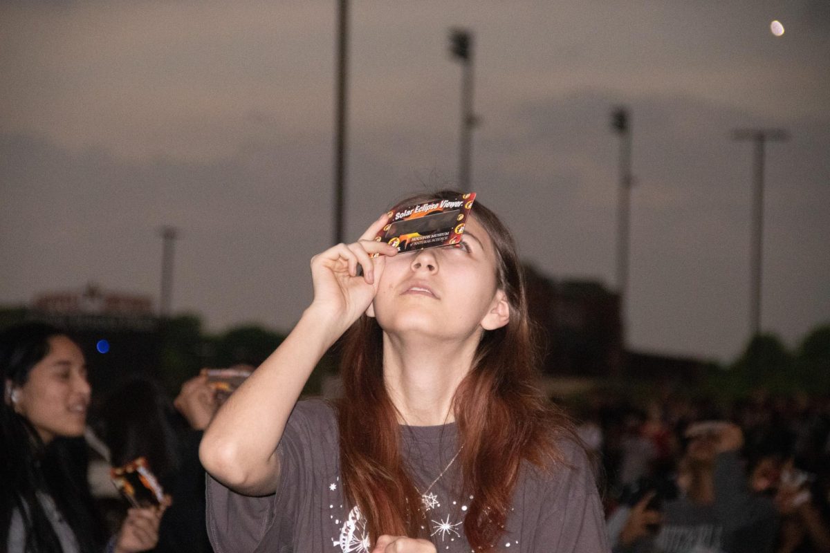 On+Monday%2C+Coppell+High+School+students+experienced+a+total+solar+eclipse+by+viewing+through+district-issued+viewfinders.+Coppell+was+on+the+path+of+totality+and+CHS+scheduled+an+evacuation+drill+from+1%3A35-1%3A55+p.m.+to+provide+students+a+viewing+experience.