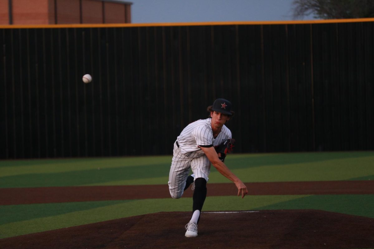 Coppell junior Drew Minnick pitches during the first inning against Plano West at Coppell ISD Softball/Baseball Complex on April 5. The Cowboys defeated the Wolves, 8-3.