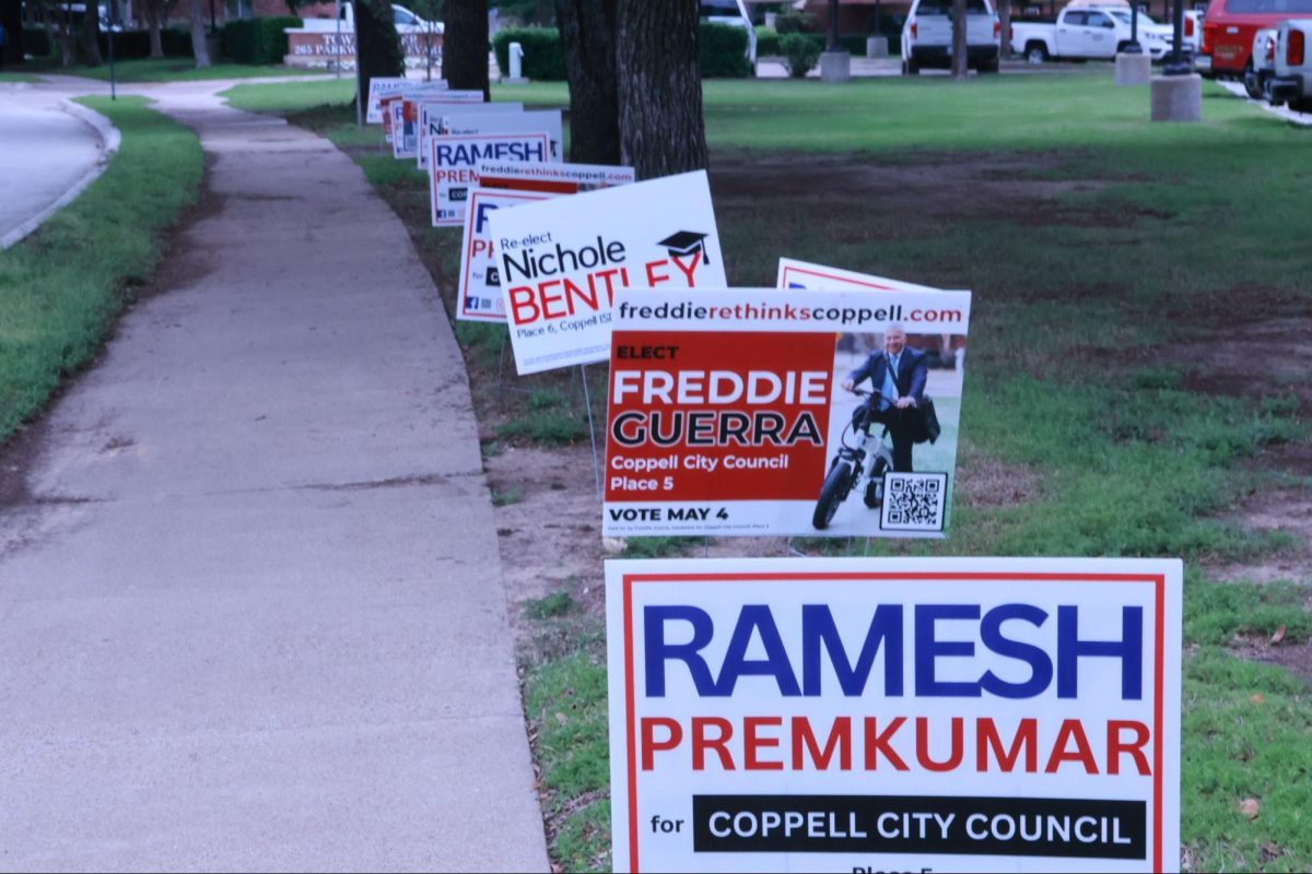 Campaign signs line the street in front of City Hall on Saturday, May 4 in Coppell. Ramesh Premkumar won the City Council Place 5 election and Nichole Bentley won the School Board Place 6 election. 