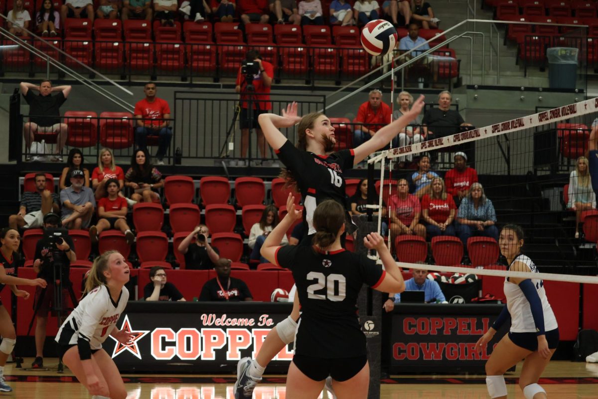 Coppell sophomore middle blocker Finley Penniman hits against Keller on Aug. 23 at the CHS Arena. The Coppell volleyball team plays Nolan Catholic today at 6:30 p.m. Photo by Sohana Singh.