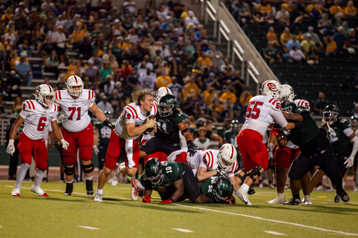 Coppell senior quarterback Edward Griffin loses his helmet against Waxahachie on Sept. 6 at Stuart B. Lumpkins Stadium. Coppell opens District 5-6A play on Friday against Hebron at Buddy Echols Field.
