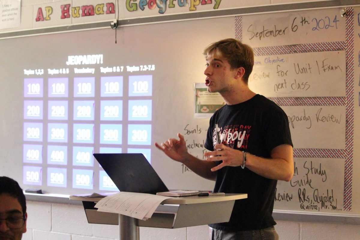 CHS9 AP Human Geography teacher Kevin Pakarinen leads a game of Jeopardy! with human geography topics in his eighth period class on Sept. 8. Pakarinen was voted as October CHS9 Teacher of the Issue by CHS9 faculty members for his enthusiasm and ability to connect with students.