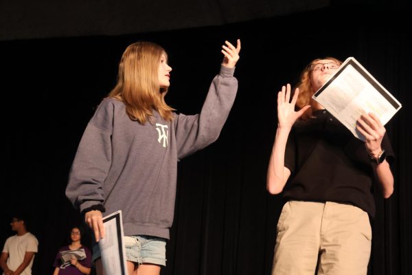 CHS9 students Dee Raibourn and Claire McSpadden rehearse “The Legend of Sleepy Hollow” in the Dome on Sept. 16. The show brings a seasonal production to CHS9 theater as Halloween approaches.