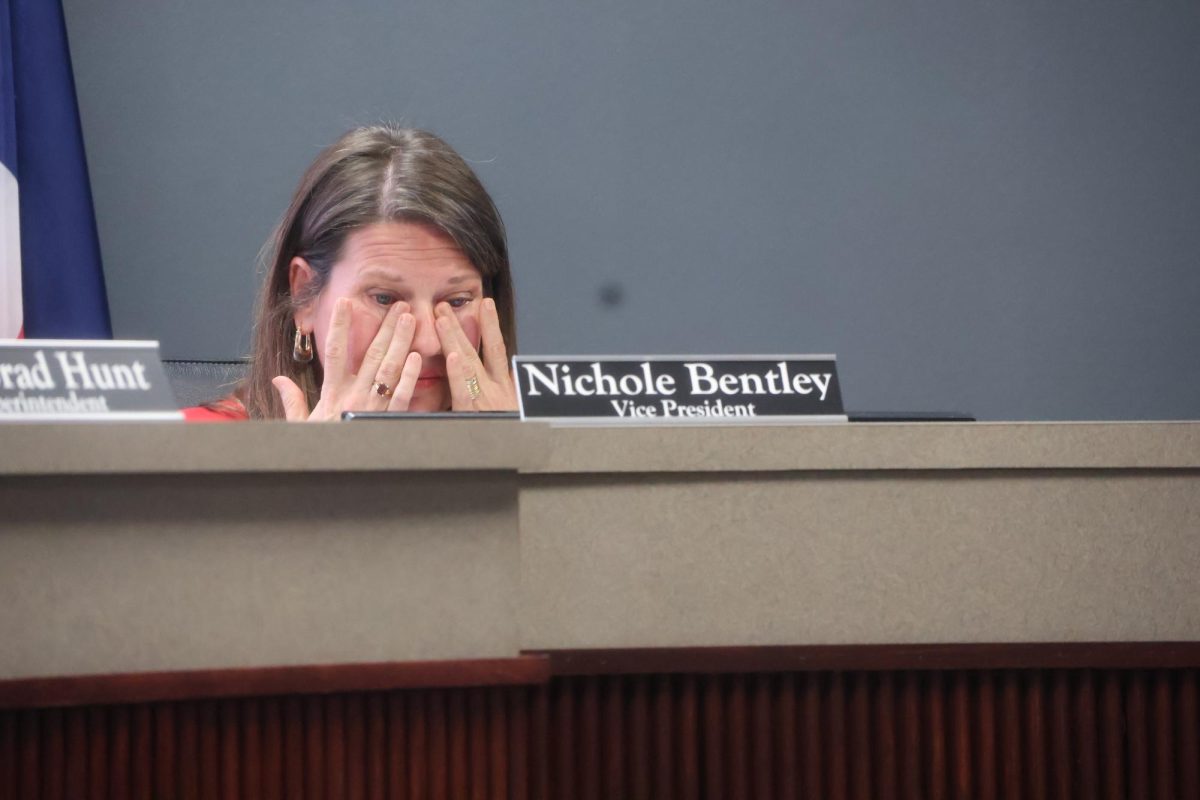 Coppell ISD trustee Nichole Bentley wipes away tears during the discussion to consolidate Pinkerton Elementary on Monday night at Vonita White Administration Building. The Board of Trustees determined that Pinkerton Elementary School would be consolidated with other CISD elementary schools due to the ongoing budget crisis.