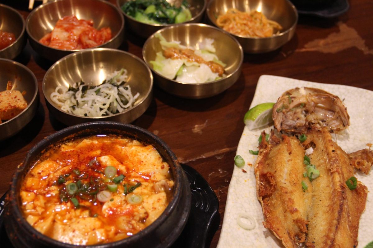 The Sidekick staff writer Katie Park orders a spicy seafood tofu soup and grilled croaker fish at Sura Korean Bistro in Carrollton. Park is thankful for Korean food as it allows her to take comfort in her culture and embrace her heritage. Photo by Katie Park