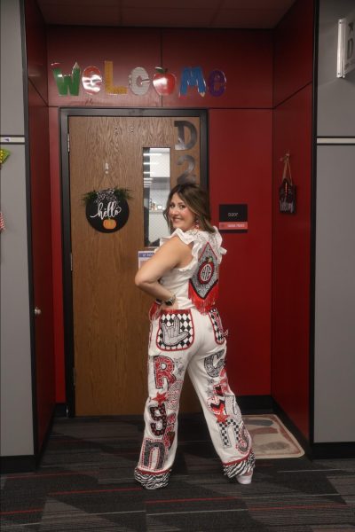 Coppell High School Honors Algebra II teacher Hanna Treece wears her overalls on Sept. 27 to show homecoming spirit. Trecce embraces Coppell spirit and connects with students. 