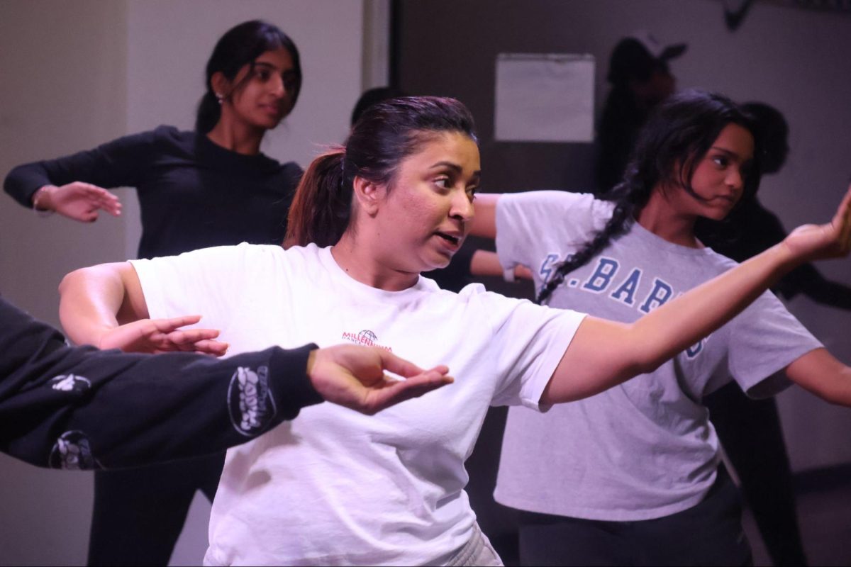 Ethnique Performing Arts director Erem Khan teaches her competitive dance class at the Frisco studio. Ethnique Performing Arts is a Bollywood dance company that recently expanded to Coppell. 