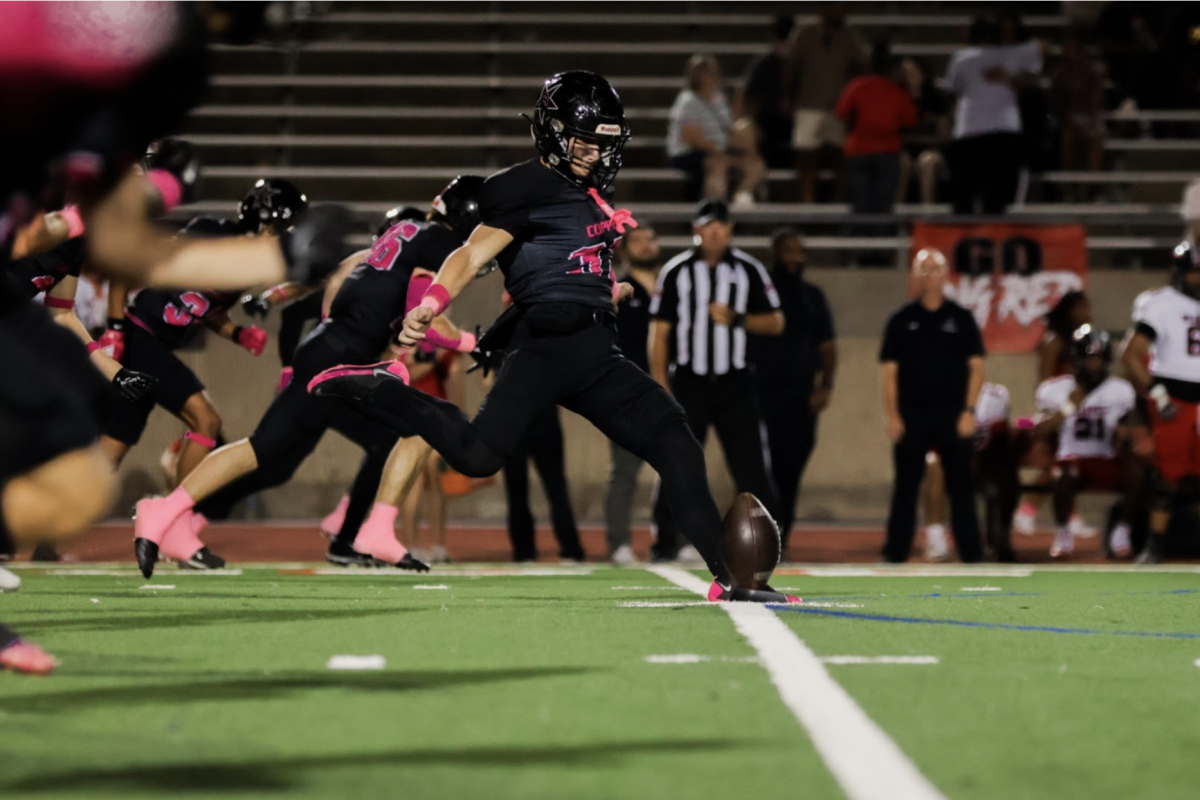 Coppell senior Bryson Patten kicks off after a touchdown against Denton Braswell on Oct. 25 at Buddy Echols Field. The Cowboys play Flower Mound on Friday as they look to secure the District 5-6A championship.