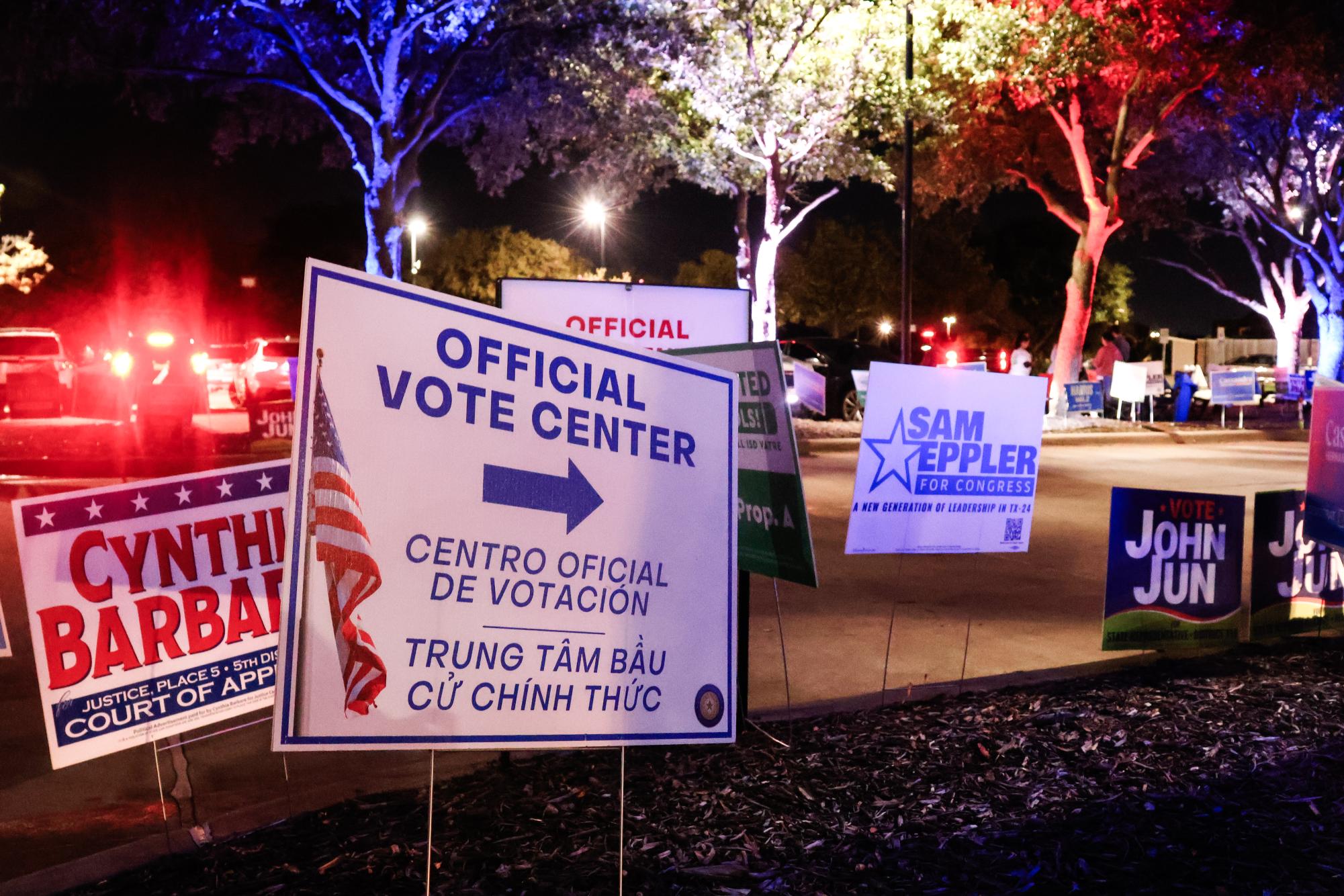 Campaign signs representing various candidates line the entrance of Town Center on Tuesday. On Election Day, Coppell citizens cast their final ballots for the 2024 elections. Photo by Caitlyn Concepcion