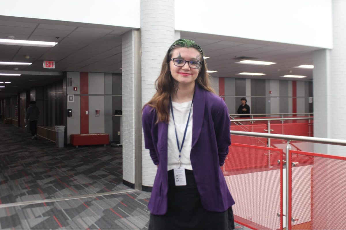 Coppell High School sophomore Lauren Halstead showcases her Joker costume on Thursday. Each year, CHS students and staff celebrate Halloween by dressing up in various costumes at school.