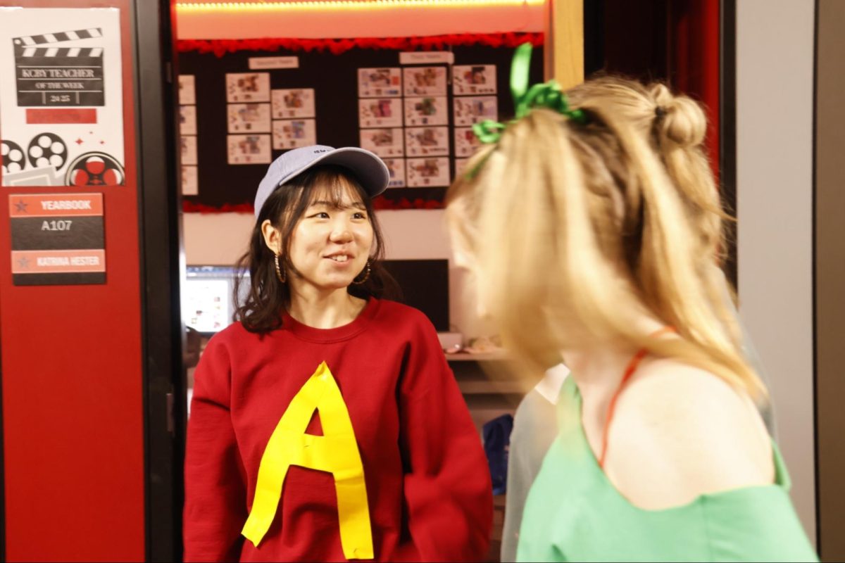 Coppell High School senior Narumi Toyota dresses up as Alvin on Thursday as part of an Alvin and the Chipmunks group costume. Each year, CHS students and staff celebrate Halloween by dressing up in various costumes at school.