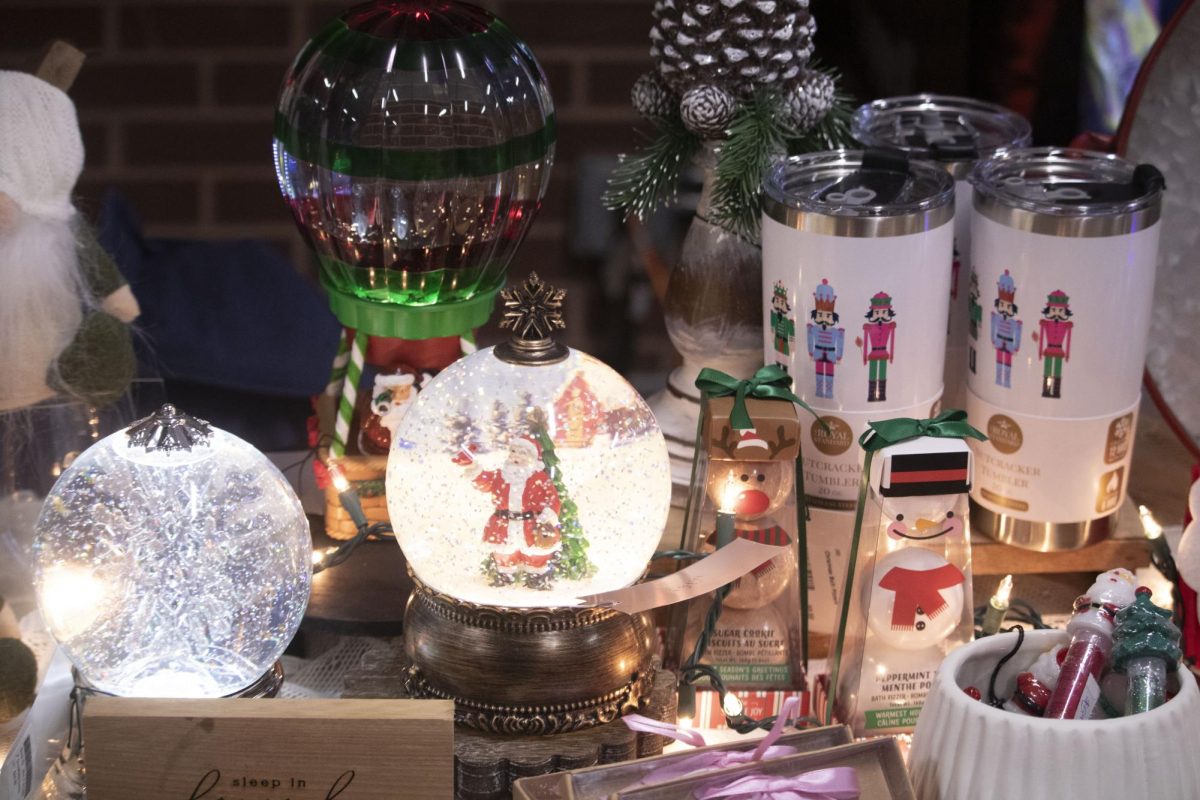 Various Christmas paraphernalia cover Finders Keepers booth at the Holiday House fundraiser. Holiday House was open from 11 a.m. to 4 p.m. at Coppell High School, where local vendors sold products for the holiday season. 