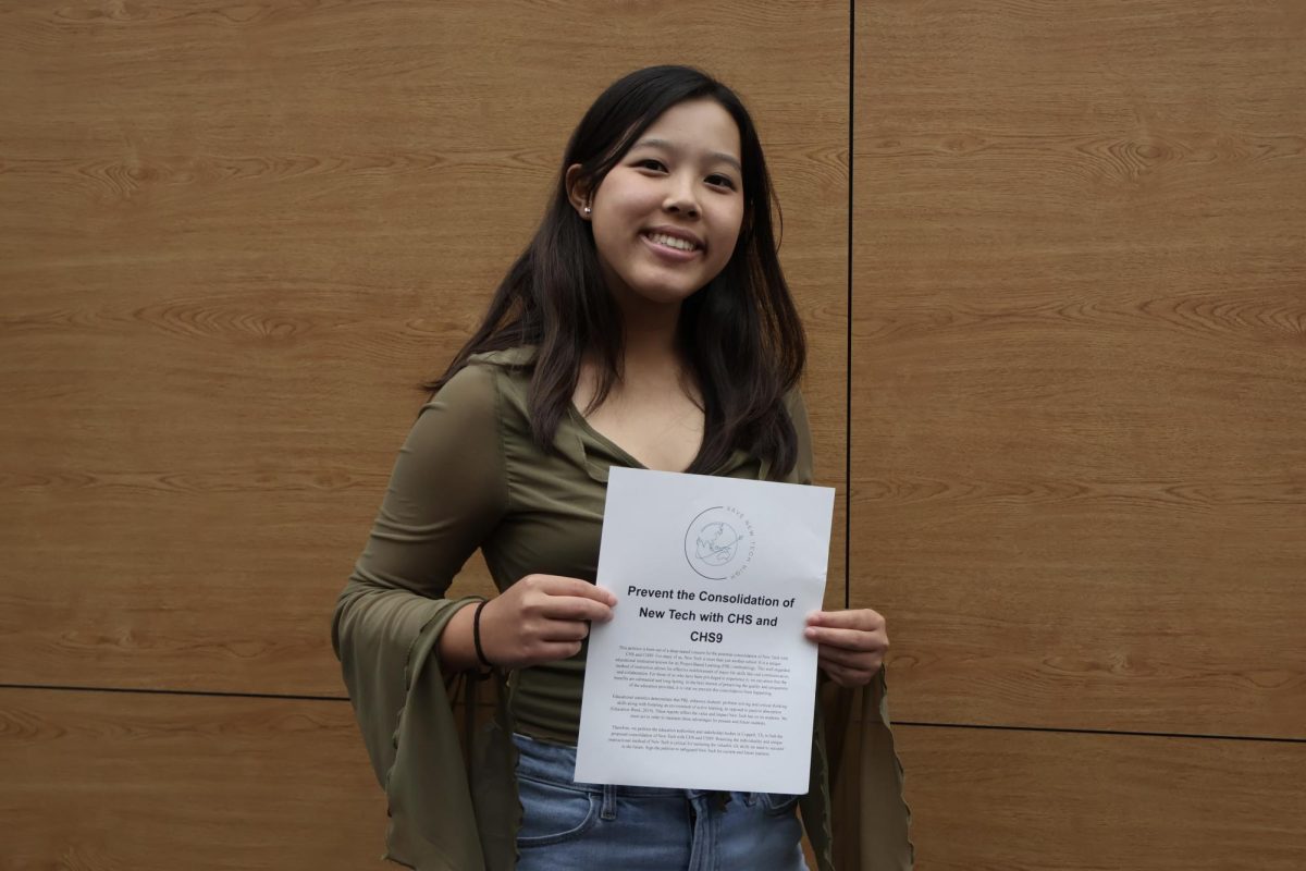 New Tech High @ Coppell sophomore Morgan Fang wrote and helped organize a petition for the consolidation of NTH@C, speaking in school board meetings. NTH@C students gathered together to protest against the consolidation of their school on Sept. 16. Photo by Eirene Park