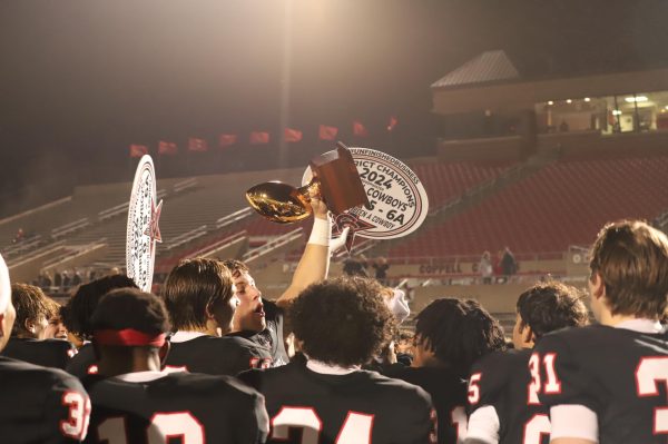 The Coppell football team celebrates its victory against Flower Mound Marcus, completing a 10-0 regular season and District 5-6A championship on Thursday at Buddy Echols Field. The Cowboys won 47-28, making program history with back-to-back undefeated regular seasons.