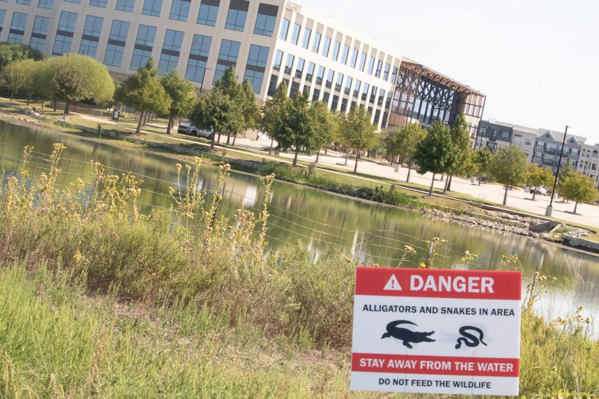 A sign at North Lake atCypress Waters warns residents of potential alligators and snakes.  This year’s alligator sightings at Denton Creek, Lake Lewisville and Cypress Waters do not pose a threat to Coppell residents, according to Texas Parks and Wildlife.