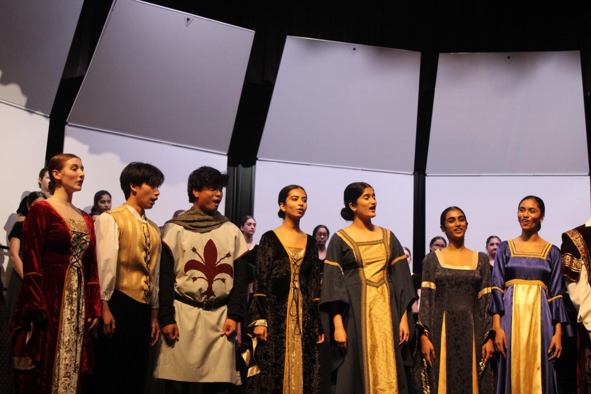 Coppell High School Madrigal seniors perform songs from the upcoming Madrigals Feast at the Fall Concert.  Coppell Choir held its Fall Concert on Oct. 15 in the CHS Auditorium. Photo by Leana Paradis