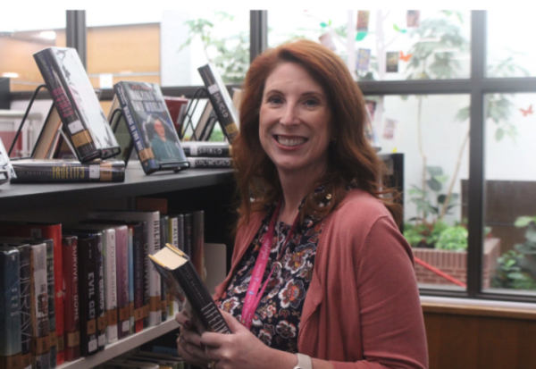 Coppell High School librarian Trisha Goins spent 20 years as a digital learning coach prior to becoming a librarian. Goins strives to make students enjoy coming to the library.