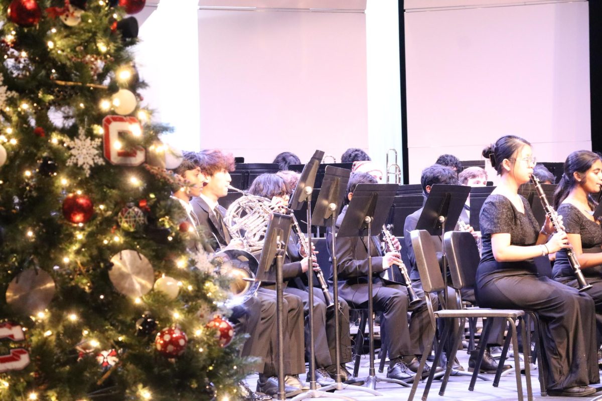 Coppell Band performs during its winter concert on Tuesday in the CHS Auditorium. The show featured a number of Christmas songs. Photo by Akshaya Ashokonand.