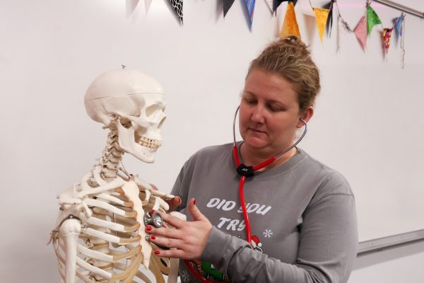 Coppell High School health science teacher Kathryn Womochel is passionate about sharing her knowledge with healthcare students. This is Womochel’s first year teaching at CHS. 