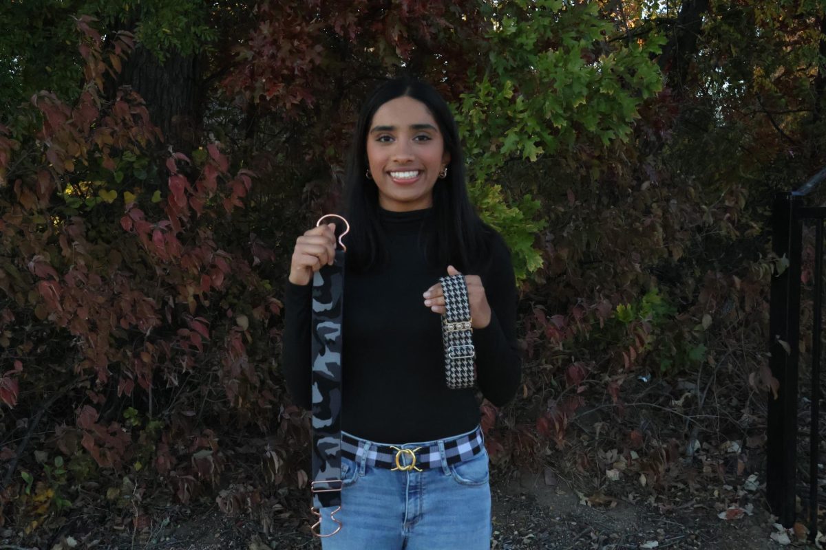 Coppell High School junior Ira Shankar showcases her bestselling belts from her business, Everlasting Belts Co. Everlasting Belts Co. is an online store specializing in belts for horseback riding.