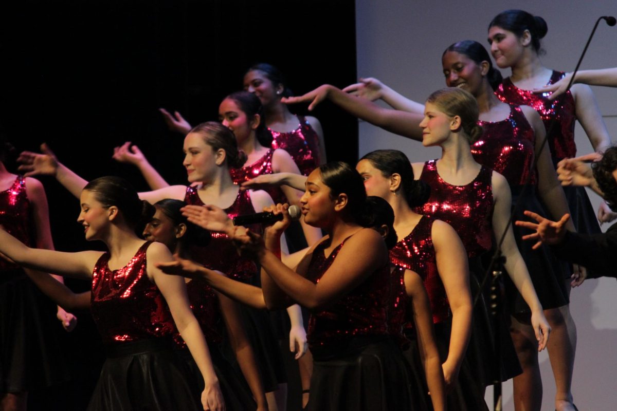 CHS9 student Varsha Pazhayidathu sings a solo for “Beautiful Day” by U2 on 11/16 in the Coppell High School Auditorium. Coppell’s show choir ensemble Vivace! showcased its Fall Show featuring the theme of other Coppell ISD show choirs with the theme: HOME.