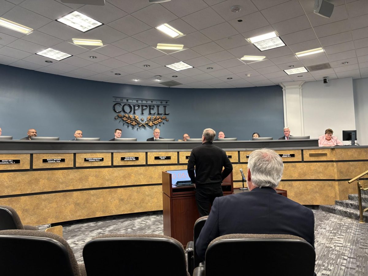 Coppell City Council members debate the motion of approving the development of two new restaurants on Tuesday night at the council meeting in Town Center.