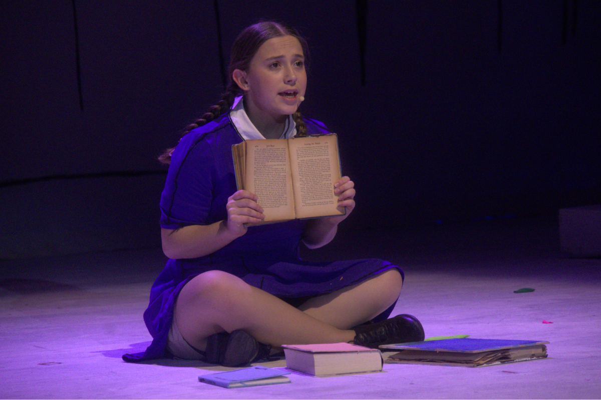 Coppell High School sophomore Lena Gay, playing Matilda, sings “Naughty” on Thursday. The Cowboy Theatre Company presents their opening show of Roald Dahl’s “Matilda the Musical” tonight at 7 p.m. Photo by Tanishka Kale