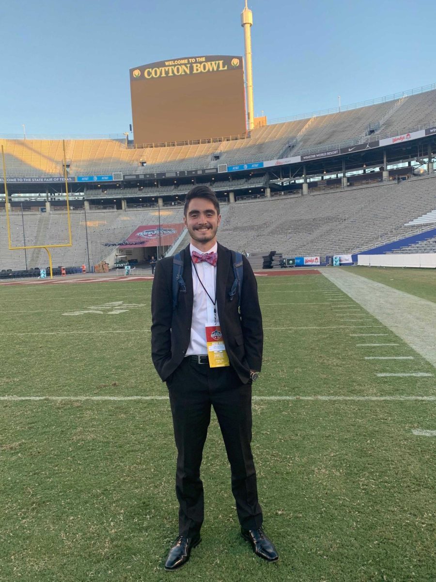 Former Daily Texan double coverage editor Marcus Krum covers the 2019 Texas-Oklahoma game at the Cotton Bowl in Dallas. Krum was executive sports editor for The Sidekick in the 2016-17 academic year and now is an associate news producer with CBS Sports in New York, working as an editorial guide for Golazo Network shows. Photo courtesy Marcus Krum