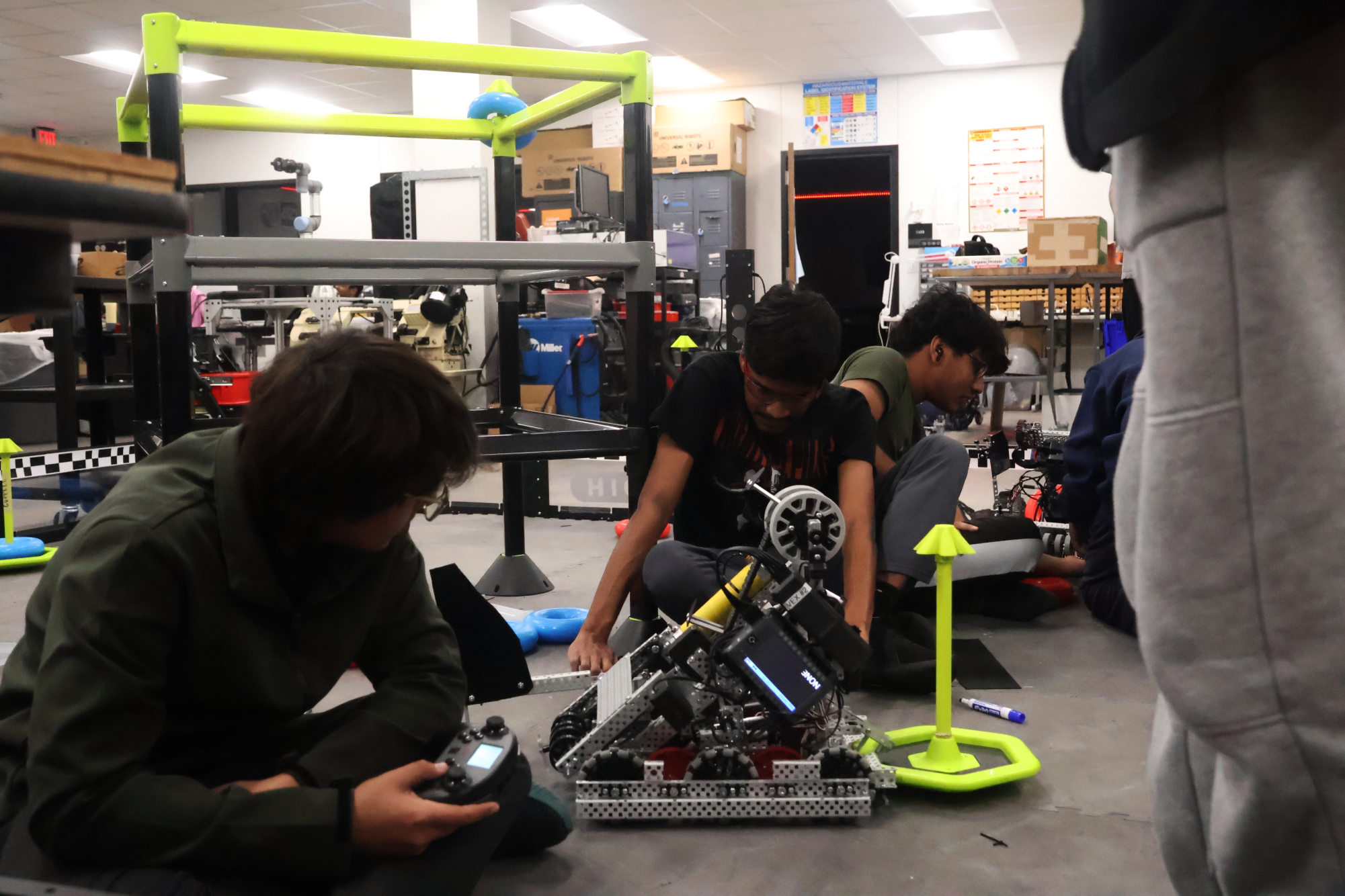 Coppell High School juniors Yug Sharma and Vignesh Somasundaram test their robot in preparation for the Region 5 High School Robotics State Championship in the Engineering Lab on Feb. 26. VEX Robotics Competition integrates STEM and soft skills needed for life beyond high school. Photo by Hiral Patel.