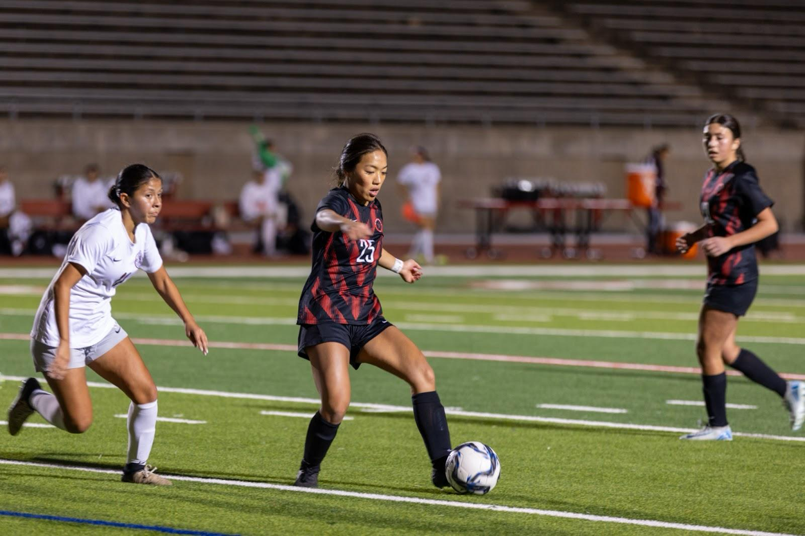 Coppell senior midfielder Summer Chen holds possession during a match against Lewisville on Jan. 31 at Buddy Echols Field. Chen is a captain for the girls soccer team and will play collegiately at Gonzaga University.