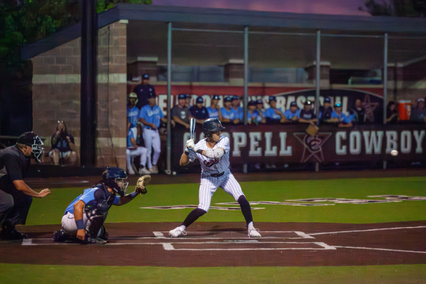 Coppell senior second baseman Jacob Van Luven bats at Coppell ISD Baseball/Softball Complex on April 17. The Cowboys lost to the Jaguars, 5-0. Photo by Sabah Uddin