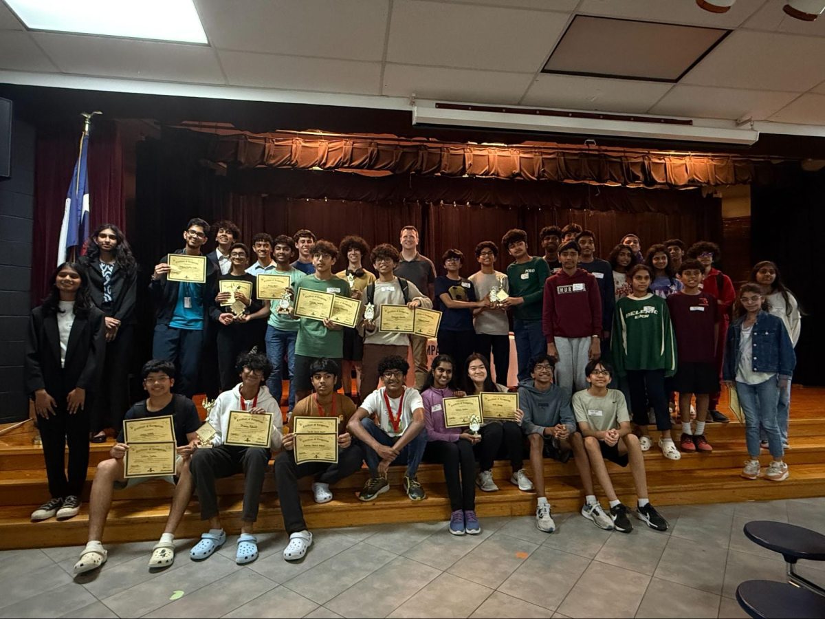 CodeQuest competitors pose together at the Austin Elementary School cafeteria on March 29. CodeQuest is a 12-hour coding hackathon, hosted by CHS9 club Impact Forward and the nonprofit organization Tomorrow’s Youth Empowerment for students in grades 6-12 to compete in coding video game projects. 