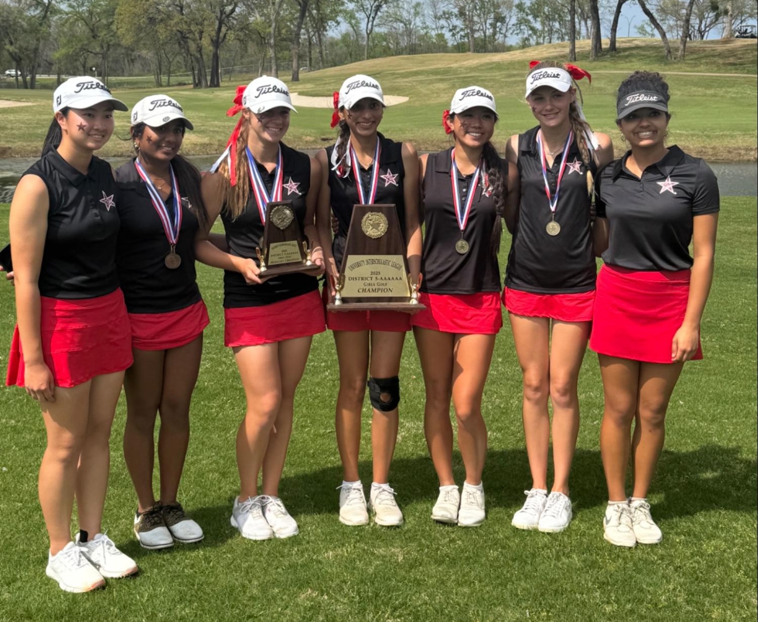 Sabrina Tam, Nethra Sheri, Alicia Bellendir, Riya Bapna, Isabella Nguyen Elizabeth Bellendir and Navmi Srithaj celebrate their first District 5-6A and Coppell's fifth District 5-6A Championship after a convincing 22-stroke victory. The Cowgirls won at Bear Creek Golf Club in Grapevine as Coppell junior Alicia Bellendir scored the lowest, being the best in the district. Photo Courtesy Gary Beyer