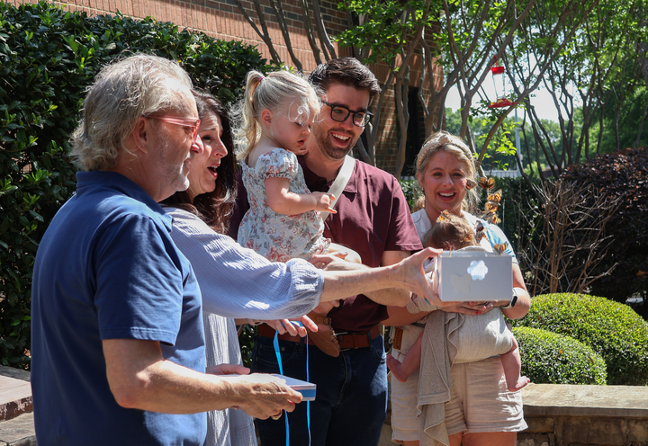 Todd Storch, Tara Storch, Ryan Storch and Jordan Storch release butterflies in honor of Taylor Storch at the Coppell Middle School East Taylor’s Garden on Thursday. CMS East rededicated the late Taylor Storch’s memorial garden with her family to celebrate her 29th birthday and National Donate Life Month