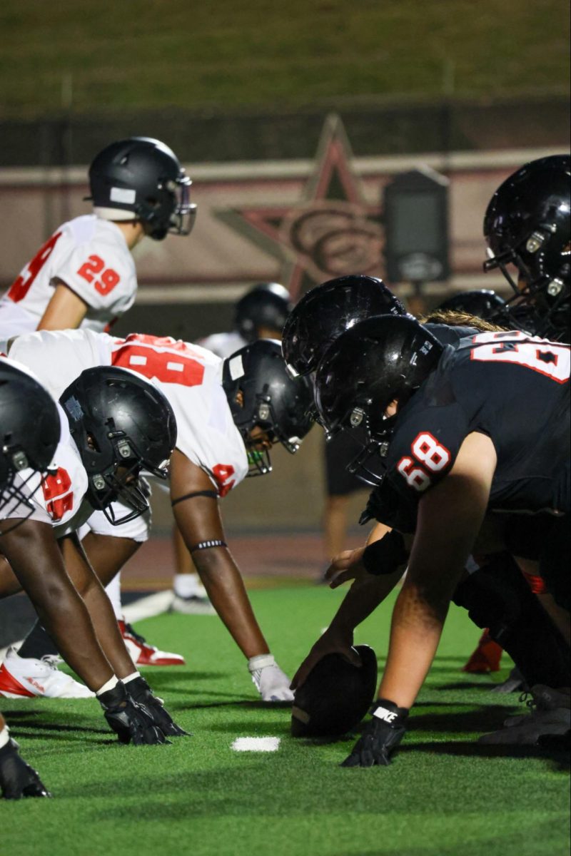 The Coppell football team scrimmages Lake HIghlands at Buddy Echols Field on Thursday night. The Cowboys and Wildcats tied, 0-0.