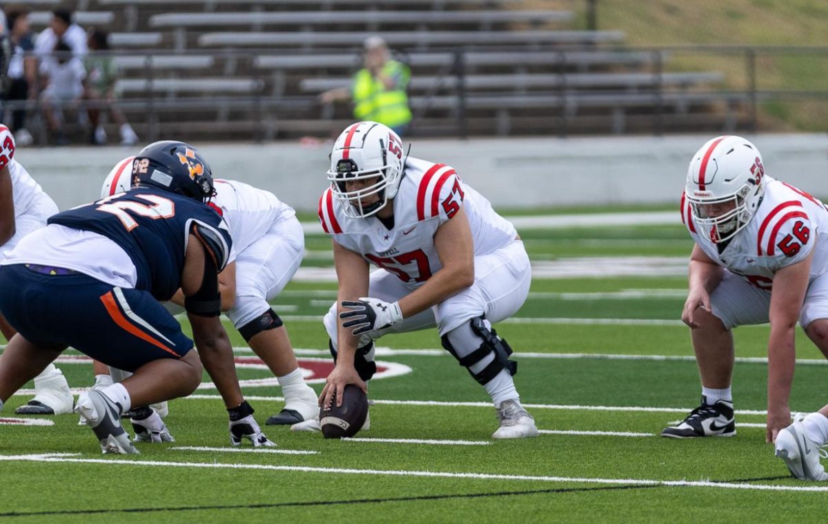 Junior offensive line Owen Olvera prepares to snap the ball against Sachse at Homer B. Johnson Stadium last Friday. The Cowboys host Waxahachie on Friday at 7 p.m. at Buddy Echols Field. Photo by Naila Ali