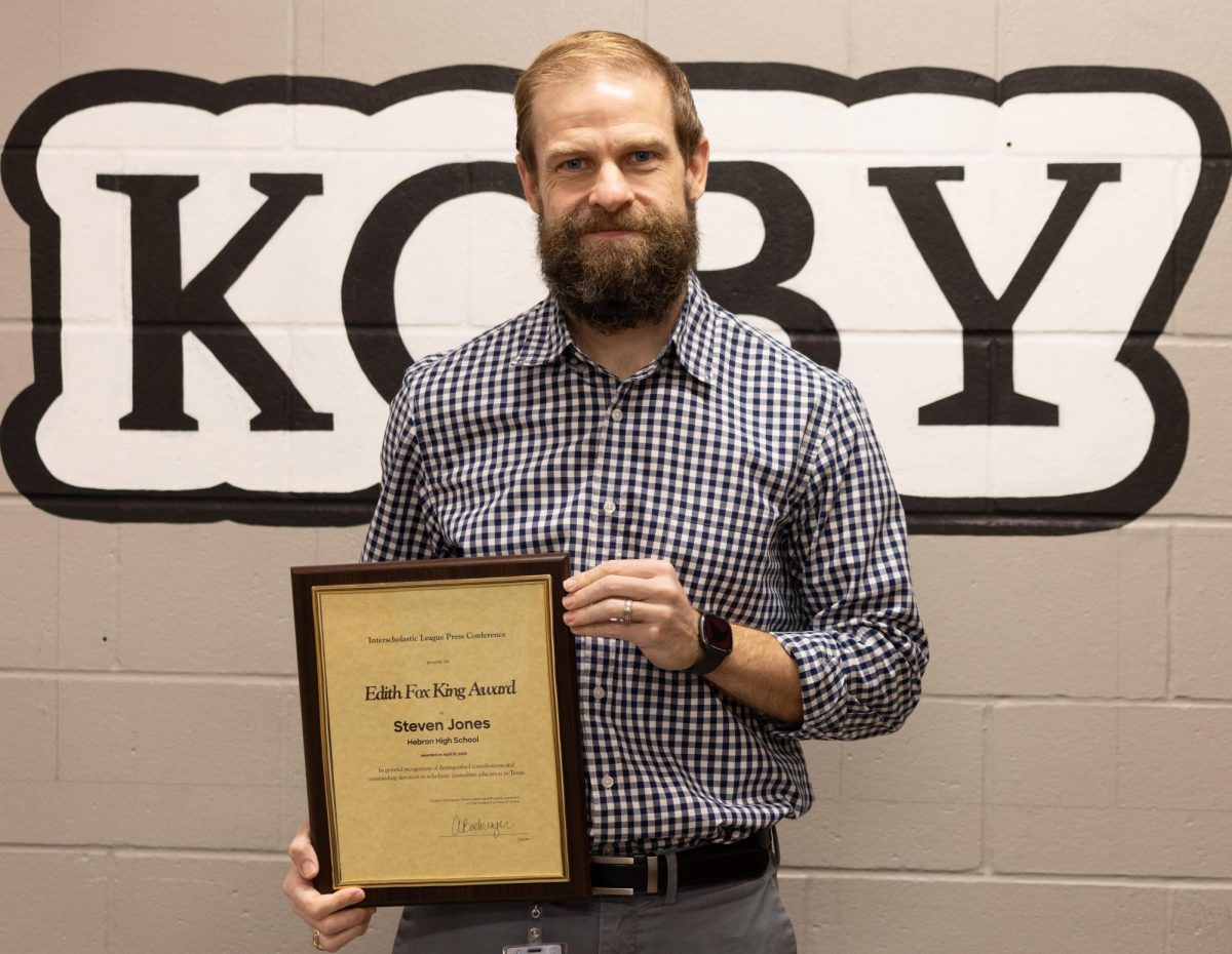 Coppell High School’s student broadcast program KCBY-TV adviser Steven Jones holds his Edith Fox King Award from the Interscholastic League Press Conference. Jones assumes the role of KCBY I adviser for the 2025-26 school year.