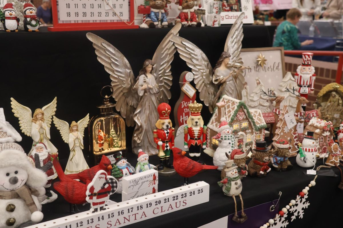 M&D Designs displays its seasonal homemade decor on Nov. 9 in the Coppell High School Commons. Holiday House celebrates its 30th anniversary with vendors selling homemade crafts and treats to provide proceeds to the CHS Senior Class Picnic. 
