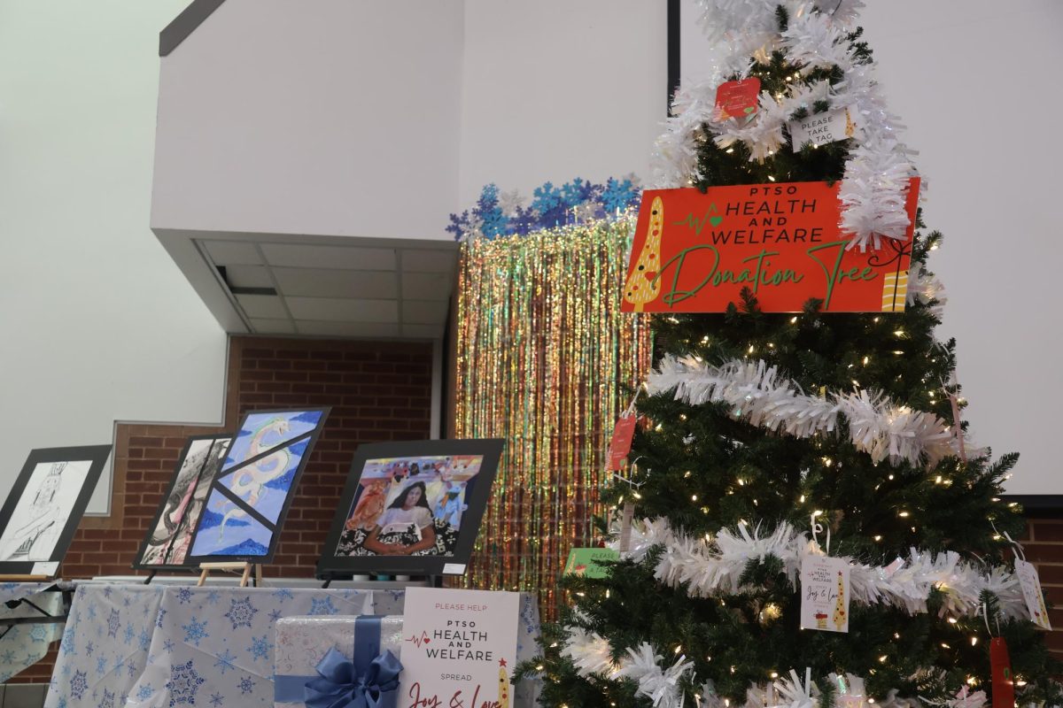 Coppell High School PTSO provides opportunities for community members to donate gifts and toys to families in Coppell ISD on Nov. 9 in the CHS Commons. Holiday House celebrated its 30th anniversary with vendors selling homemade crafts and treats to provide proceeds to the CHS senior class picnic.
