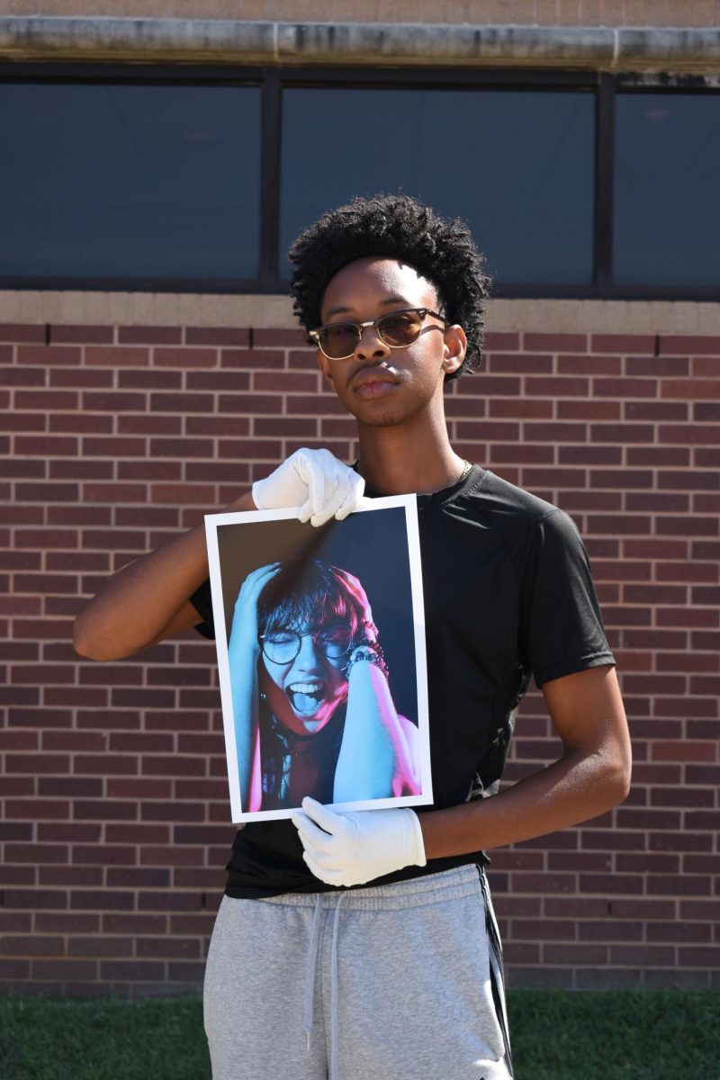 Coppell senior Keyon Johnson presents a vibrant portrait using creative colored lighting to convey emotion and intensity. Johnson’s passion for photography pushes him on a path to success.