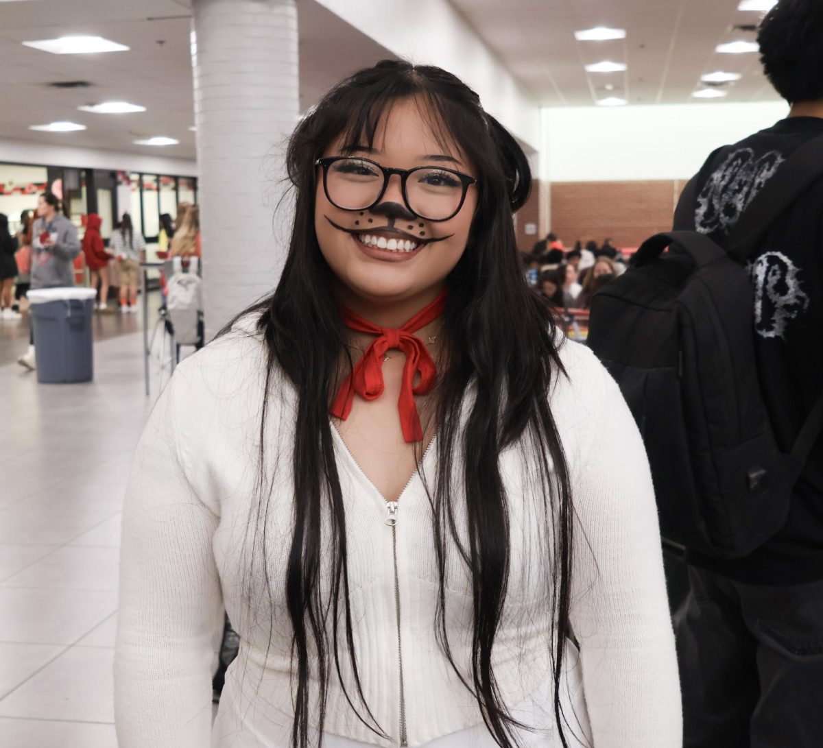 Coppell High School sophomore Zoey Cheah dresses as Snoopy from the Peanuts for her Halloween costume on Oct. 31 at Coppell High School. CHS students and staff at Coppell High School celebrate Halloween during school in honor of Red Ribbon Week.