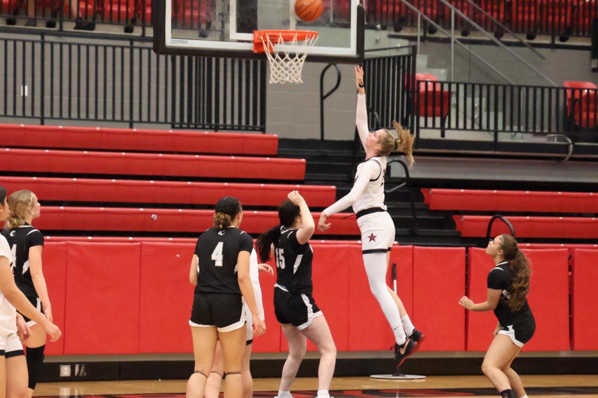Coppell senior forward Adriana Reijnen goes for a layup against Denton Guyer on Tuesday at CHS Arena. The Cowgirls defeated the Wildcats, 54-51.