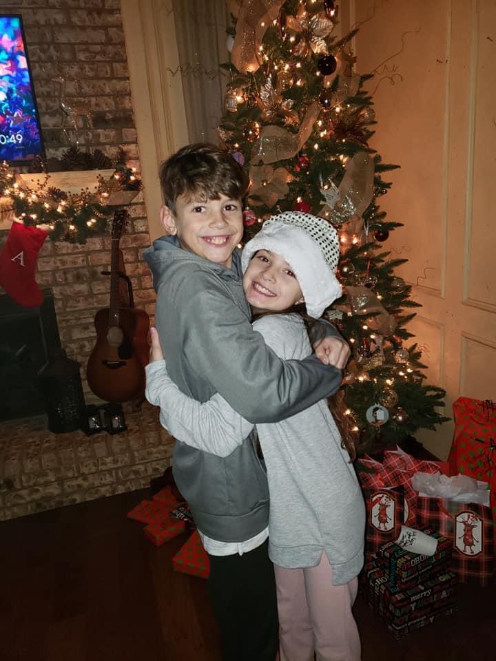 Avary and Jaxon Campbell embrace in 2019. Avary honors her late brother Jaxon’s legacy by playing basketball for him. Photo courtesy Katherine Campbell