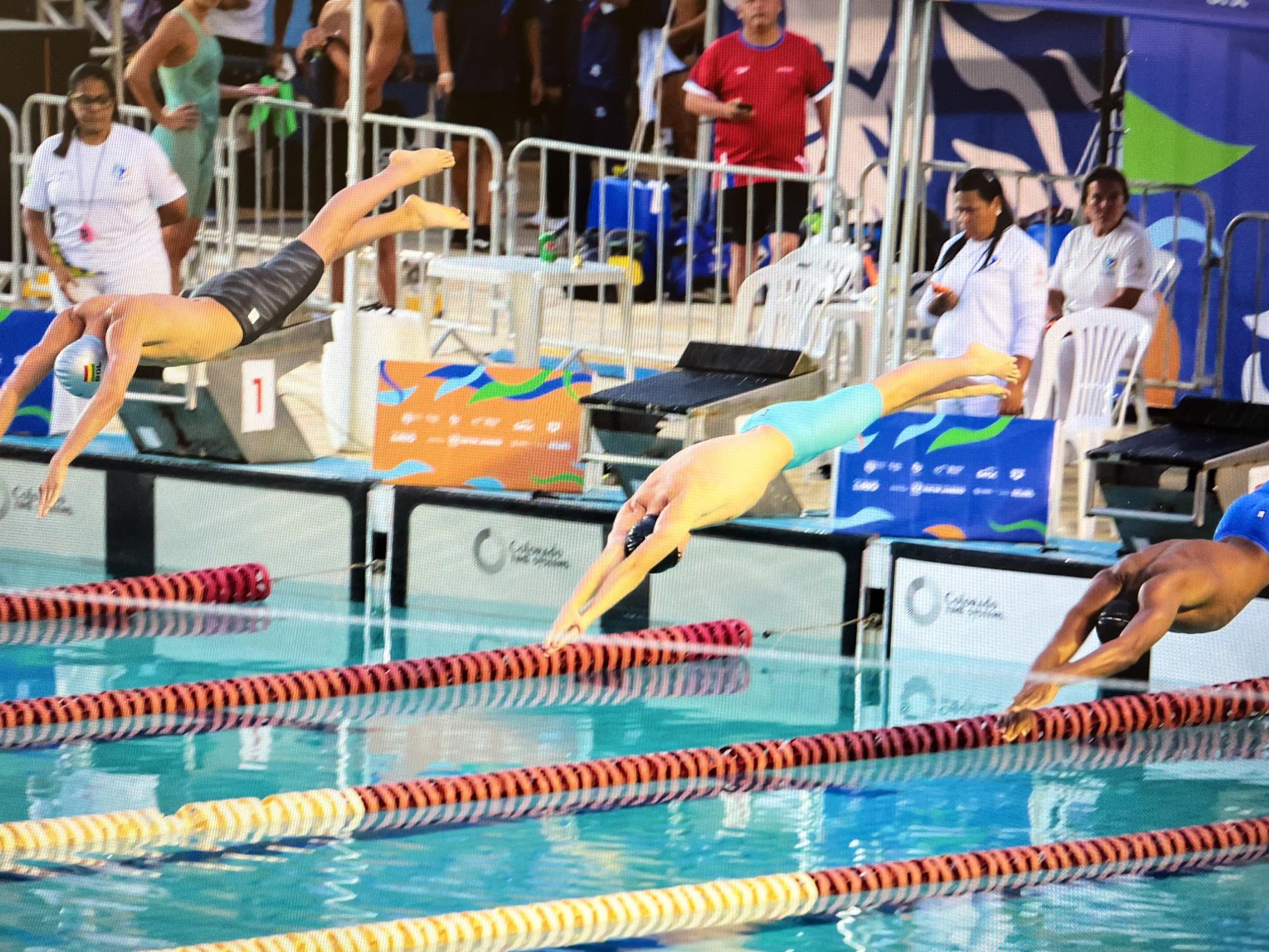 Coppell High School senior Gabriel Campos (center) competes for Chile in October at the South American Youth Championships held in Brazil. Campos signed with Penn State University in November, treading closer to his dream of competing in the Olympics. Photo courtesy Gabriel Campos