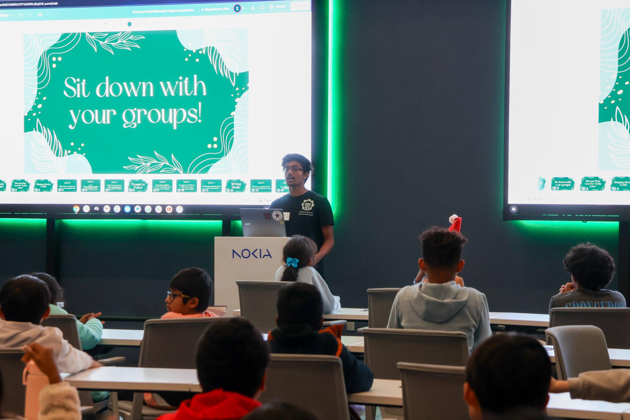 Coppell High School sophomore SAGE co-founder/vice president Rohan Jain opens the final artificial intelligence seminar of SAGE’s AI series on Dec. 16 at Nokia in Cypress Waters. SAGE collaborated with Nokia for an AI seminar and activity tour.