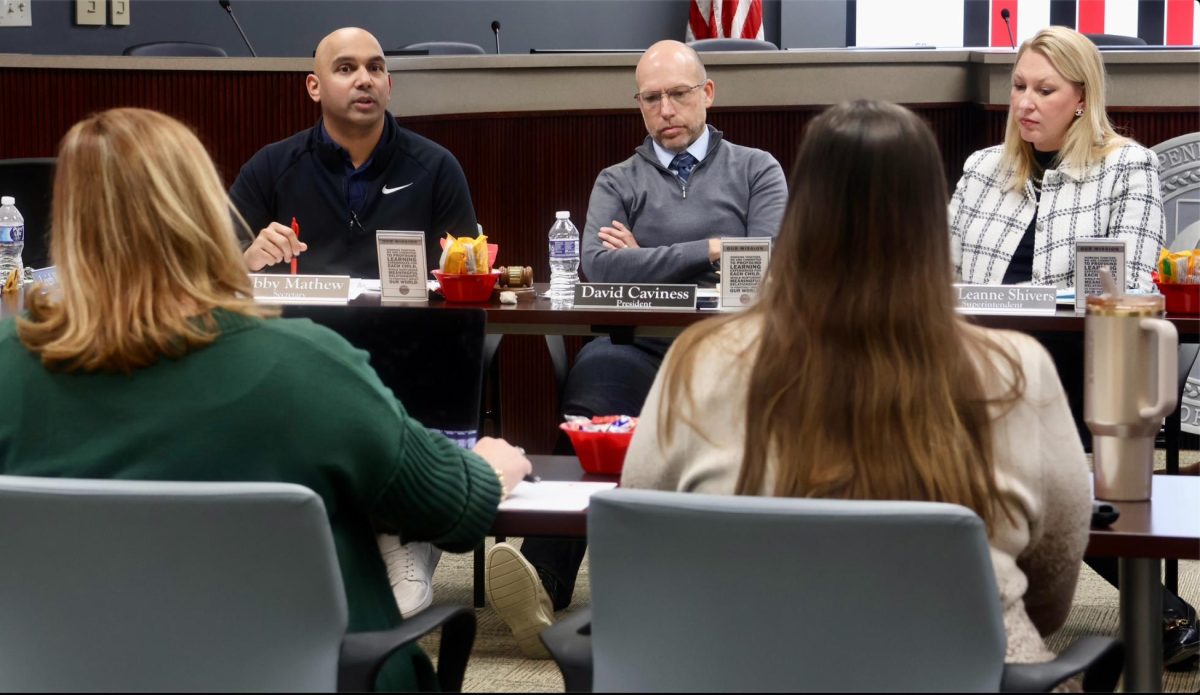 Coppell ISD trustee Jobby Mathew, trustee David Caviness and Superintendent Dr. Leanne Shivers discuss the 2026-27 calendar with assistant superintendent for curriculum and instruction Dr. Angie Brooks on Monday at the Vonita White Administration Building. The Coppell ISD Board of Trustees’s Board Workshop discussed budget planning, 2026-27 calendar and considered approval of additional Early Resignation Notice Incentives.