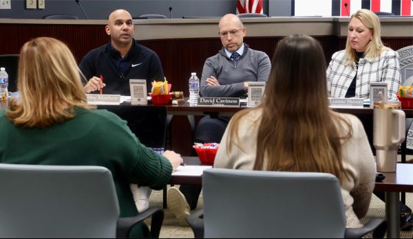 Coppell ISD trustee Jobby Mathew, trustee David Caviness and Superintendent Dr. Leanne Shivers discuss the 2026-27 calendar with assistant superintendent for curriculum and instruction Dr. Angie Brooks on Monday at the Vonita White Administration Building. The Coppell ISD Board of Trustees’s Board Workshop discussed budget planning, 2026-27 calendar and considered approval of additional Early Resignation Notice Incentives.