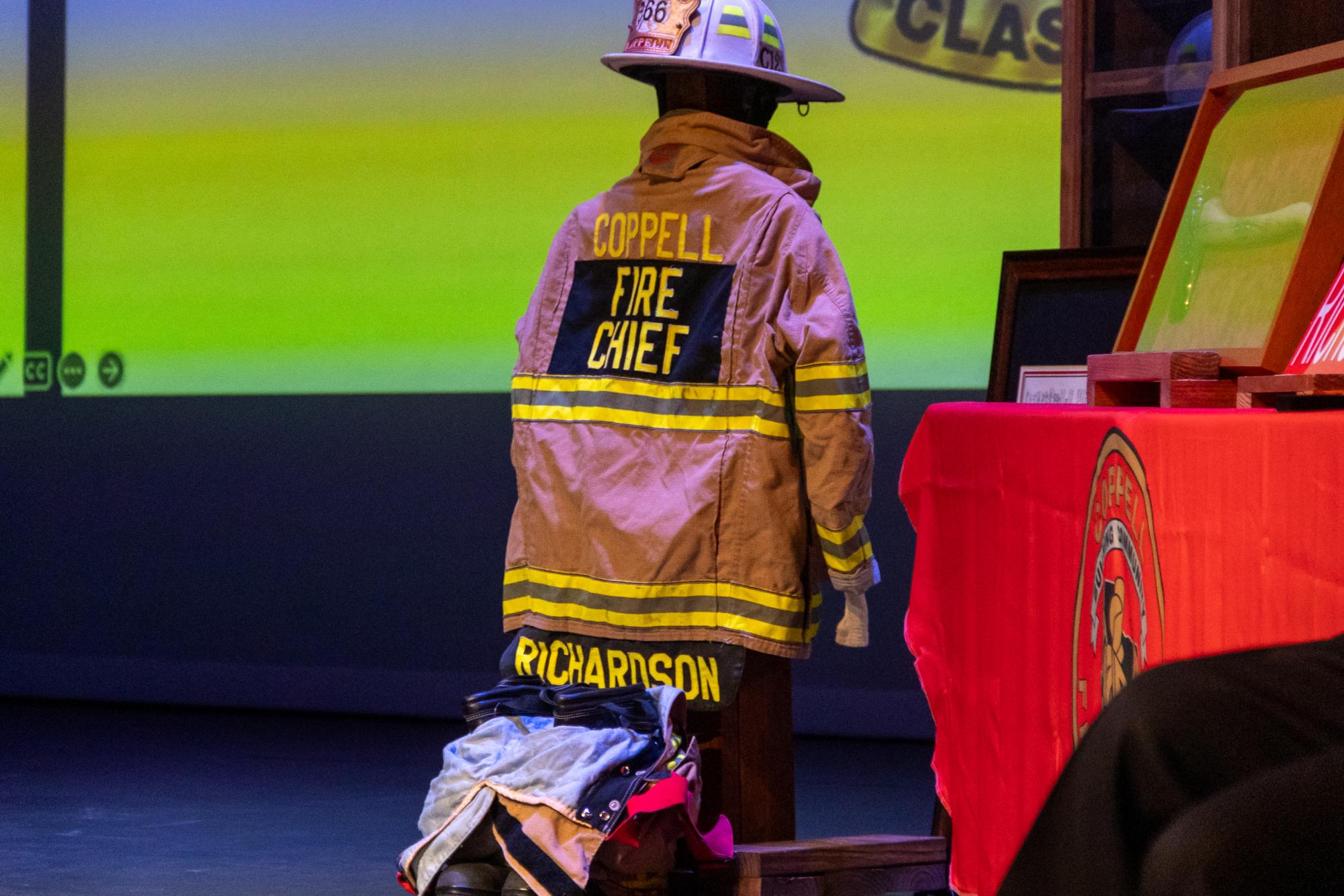Coppell Fire Department Chief Kevin Richardson’s uniform and gifts are on display at his retirement ceremony at The Coppell Arts Center on Tuesday. After serving as the Coppell Fire Department’s Chief for two decades, Richardson’s last day is Friday. 
